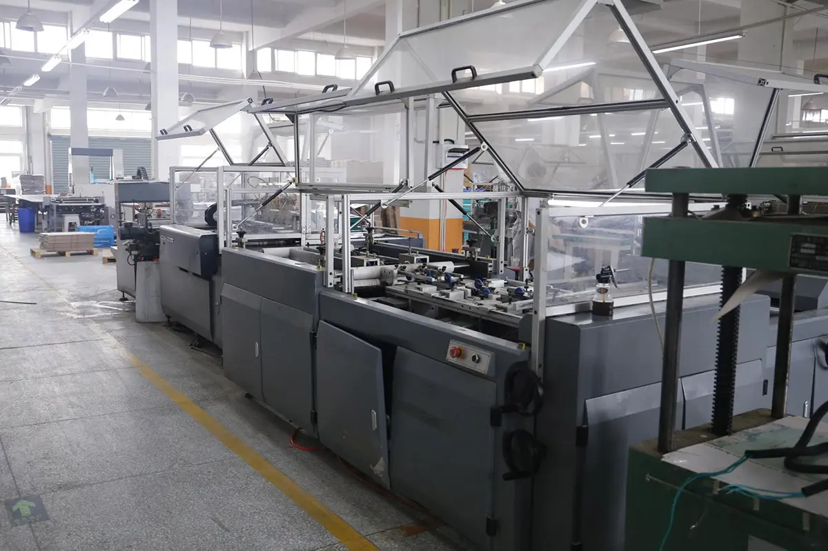 Row of packaging machines on the factory floor