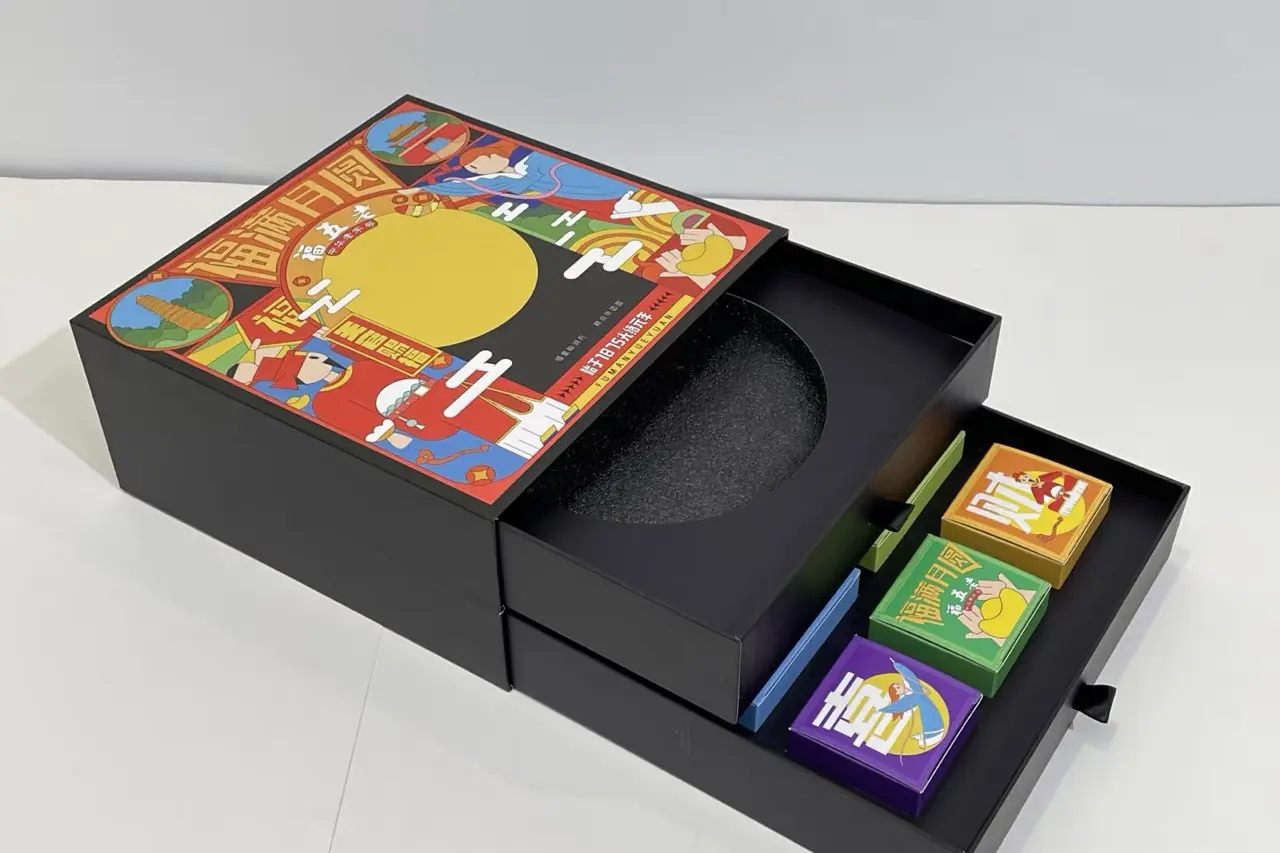Drawer-style gift box with product compartments for structure comparison