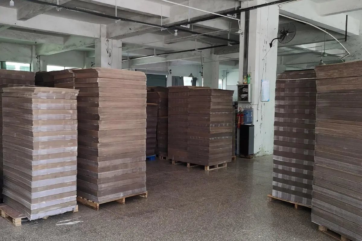 corrugated shipping cartons stacked in the packaging factory