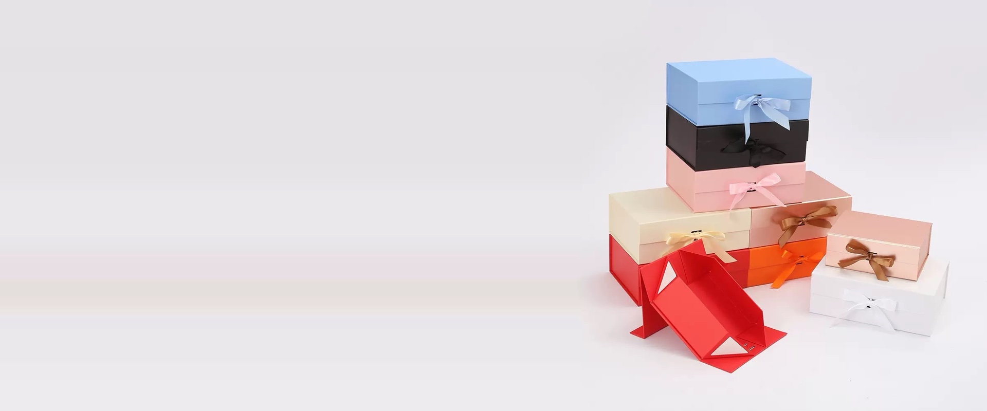 Custom foldable magnetic boxes in finished and flat-pack forms