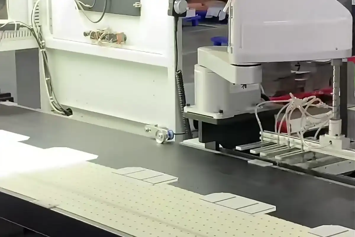 Worker completing the final hand assembly of a real magnetic gift box