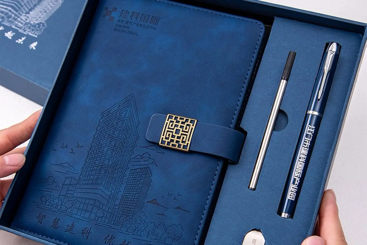 Blue electronics retail gift box with fitted accessory tray
