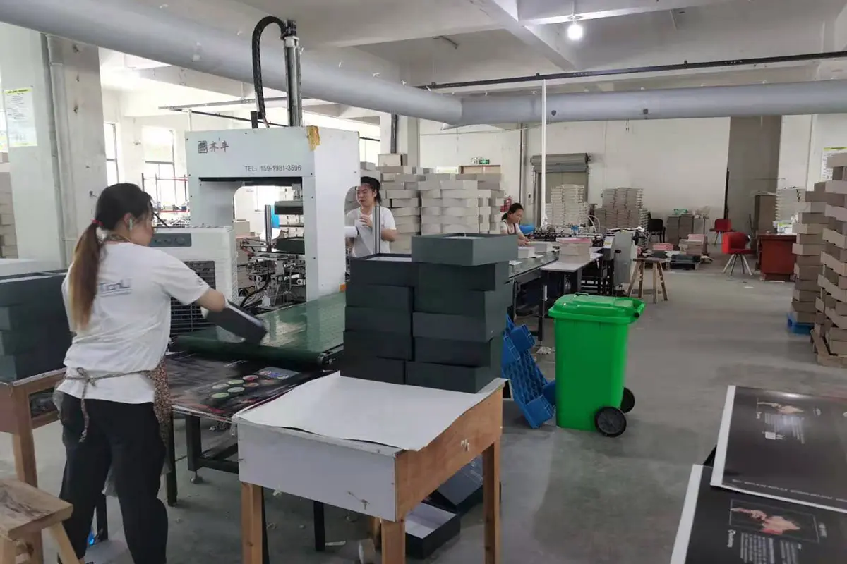 Luxury gift packaging shipping protection with outer carton and surface wrapping